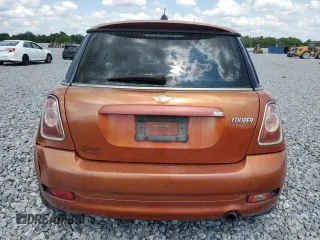 2011 MINI Hardtop with VIN WMWSU3C52BT094399, listed as a Copart auction lot 56561635 with 94,428 mi miles and Salvage Title. Bid and sale history available at DreamBid. Image 6.