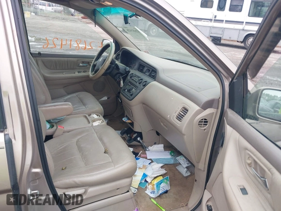2003 Honda Odyssey EX-L with VIN 5FNRL180X3B151488, listed as a IAAI auction lot 42681426 with 231,065 mi miles and . Bid and sale history available at DreamBid. Image 5.