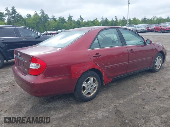 2003 Toyota Camry LE z VIN 4T1BF32K63U050174, wystawiony jako IAAI lot #42260843 z przebiegiem 210 486 mil mil oraz . Historia ofert i sprzedaży dostępna na DreamBid. Obrazek 4.