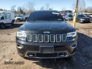 2019 Jeep Grand Cherokee Overland with VIN 1C4RJFCG9KC569575, listed as a Copart auction lot 48952875 with 87,053 mi miles and Salvage Title. Bid and sale history available at carsss.com. Image 5.