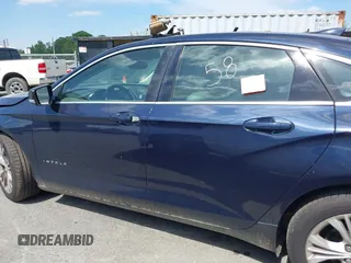 2015 Chevrolet Impala LT with VIN 2G1125S30F9291027, listed as a IAAI auction lot 42090216 with 215,599 mi miles and . Bid and sale history available at DreamBid. Image 14.