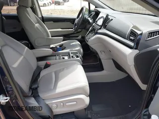 2022 Honda Odyssey Touring with VIN 5FNRL6H86NB004865, listed as a IAAI auction lot 42254009 with 47,229 mi miles and . Bid and sale history available at DreamBid. Image 5.