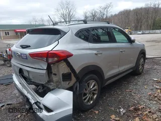 2017 Hyundai Tucson SE with VIN KM8J3CA45HU272171, listed as a IAAI auction lot 41801230 with 100,541 mi miles. Bid and sale history available at carsss.com. Image 4.