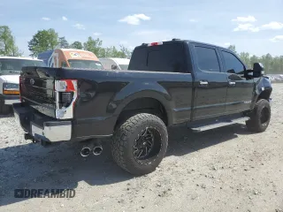 2021 Ford Super Duty F-250 SRW XL with VIN 1FT7W2BT1MEC51277, listed as a Copart auction lot 54199165 with 99,324 mi miles and Salvage Title. Bid and sale history available at carsss.com. Image 3.