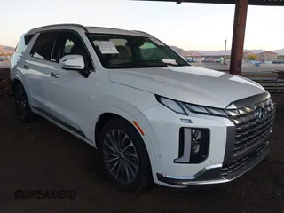 2023 Hyundai Palisade Calligraphy z VIN KM8R74GE7PU590854, wystawiony jako IAAI lot #42087367 z przebiegiem 34 909 mil mil oraz . Historia ofert i sprzedaży dostępna na DreamBid. Obrazek 1.