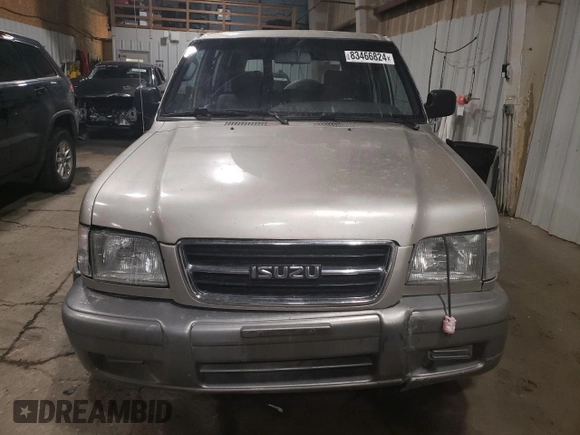 1999 Isuzu Trooper S z VIN JACDJ58X8X7915370, wystawiony jako Copart lot #83466824 z przebiegiem 143 588 mil mil oraz Czysty tytuł • Clean title. Historia ofert i sprzedaży dostępna na DreamBid. Obrazek 5.
