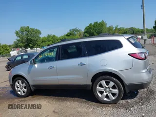 2016 Chevrolet Traverse LT with VIN 1GNKRGKD3GJ275039, listed as a IAAI auction lot 42578461 with 131,843 mi miles and . Bid and sale history available at DreamBid. Image 14.
