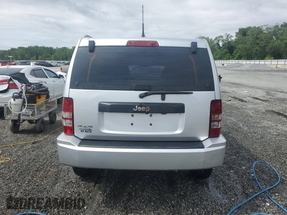 2011 Jeep Liberty Sport with VIN 1J4PN2GK4BW543087, listed as a Copart auction lot 59131595 with 127,989 mi miles and Salvage title. Bid and sale history available at DreamBid. Image 6.
