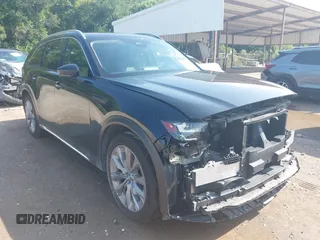 2024 Mazda CX-90 Premium z VIN JM3KKDHD2R1162678, wystawiony jako IAAI lot #42390508 z przebiegiem 25 098 mil mil oraz . Historia ofert i sprzedaży dostępna na DreamBid. Obrazek 1.
