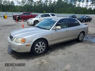2004 Kia Optima LX z VIN KNAGD128845342264, wystawiony jako Copart lot #61550655 z przebiegiem 203 962 mil mil oraz Szkoda całkowita • Salvage title. Historia ofert i sprzedaży dostępna na DreamBid. Obrazek 1.