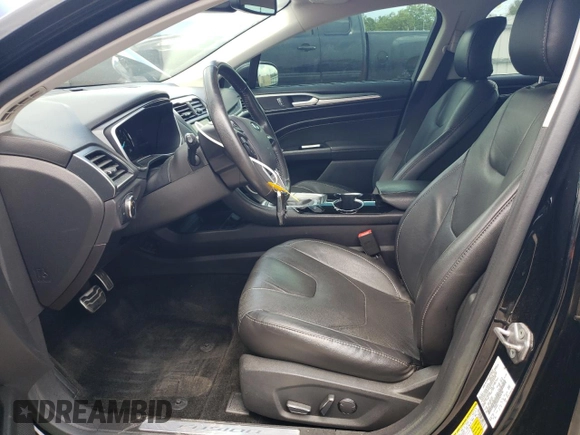 2016 Ford Fusion Titanium Hybrid with VIN 3FA6P0RUXGR204106, listed as a Copart auction lot 62769015 with 106,826 mi miles and Salvage title. Bid and sale history available at DreamBid. Image 7.