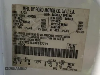 2003 Ford Super Duty F-250 XL with VIN 1FTNX21L83EB37779, listed as a Copart auction lot 77220014 with 160,011 mi miles and Salvage Title. Bid and sale history available at carsss.com. Image 13.