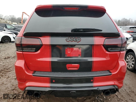 2020 Jeep Grand Cherokee Trackhawk with VIN 1C4RJFN95LC334610, listed as a Copart auction lot 49160944 with 23,348 mi miles and Salvage title. Bid and sale history available at DreamBid. Image 6.