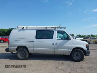 2014 Ford Econoline Cargo Commercial with VIN 1FTNE1EW4EDB20183, listed as a IAAI auction lot 42231075 with 260,818 mi miles and . Bid and sale history available at DreamBid. Image 13.