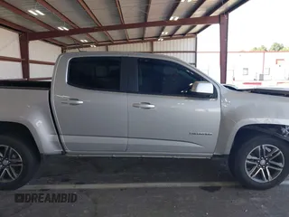 2020 Chevrolet Colorado 4WD Work Truck with VIN 1GCGTBEN3L1215909, listed as a IAAI auction lot 42591564 with 45,369 mi miles and . Bid and sale history available at DreamBid. Image 14.