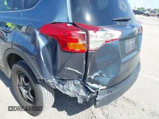 2014 Toyota RAV4 LE with VIN 2T3ZFREV1EW093290, listed as a IAAI auction lot 42343278 with 318,635 mi miles and . Bid and sale history available at DreamBid. Image 6.