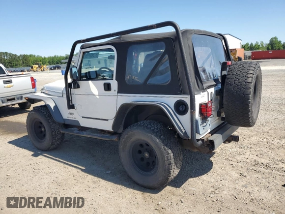 2003 Jeep Wrangler X with VIN 1J4FA39S13P311214, listed as a Copart auction lot 57345175 with 75,088 mi miles and Salvage title. Bid and sale history available at DreamBid. Image 2.