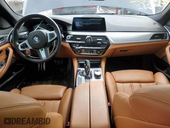 2020 BMW 5 Series z VIN WBAJB1C04LCD27469, wystawiony jako Copart lot #85962264 z przebiegiem 112 807 mil mil oraz Czysty tytuł • Clean title. Historia ofert i sprzedaży dostępna na DreamBid. Obrazek 8.