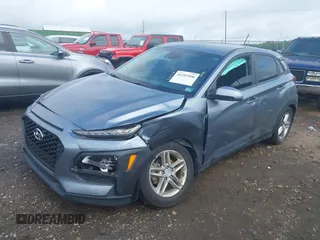 2019 Hyundai Kona SE with VIN KM8K12AAXKU298329, listed as a IAAI auction lot 42297990 with 57,176 mi miles and . Bid and sale history available at DreamBid. Image 2.