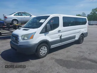 2015 Ford Transit XL z VIN 1FBZX2ZM5FKA37860, wystawiony jako IAAI lot #42059536 z przebiegiem 146 928 mil mil oraz . Historia ofert i sprzedaży dostępna na DreamBid. Obrazek 2.
