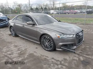 2016 Audi A6 Prestige z VIN WAUHGAFC8GN081040, wystawiony jako IAAI lot #41941514 z przebiegiem 129 358 mil mil oraz . Historia ofert i sprzedaży dostępna na DreamBid. Obrazek 1.