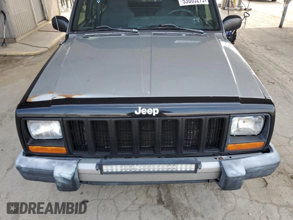 2000 Jeep Cherokee with VIN 1J4FF48S7YL221475, listed as a Copart auction lot 53005275 with 273,246 mi miles and Clean title. Bid and sale history available at DreamBid. Image 12.