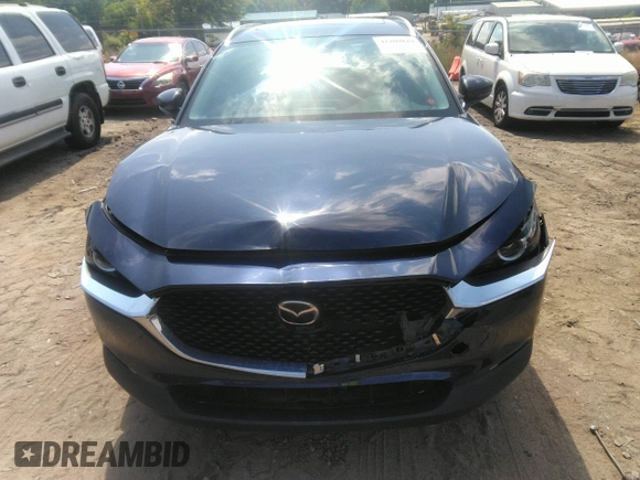 2022 Mazda CX-30 S Carbon Edition with VIN 3MVDMBCL6NM423255, listed as a IAAI auction lot 42209829 with 51,589 mi miles and . Bid and sale history available at DreamBid. Image 12.