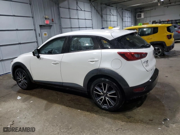 2018 Mazda CX-3 Touring with VIN JM1DKFC78J0308512, listed as a Copart auction lot 42397405 with 76,838 mi miles and Salvage Title. Bid and sale history available at carsss.com. Image 2.