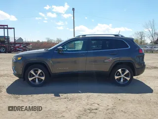 2019 Jeep Cherokee Limited z VIN 1C4PJMDX5KD250730, wystawiony jako IAAI lot #42072064 z przebiegiem 71 183 mil mil oraz . Historia ofert i sprzedaży dostępna na DreamBid. Obrazek 14.