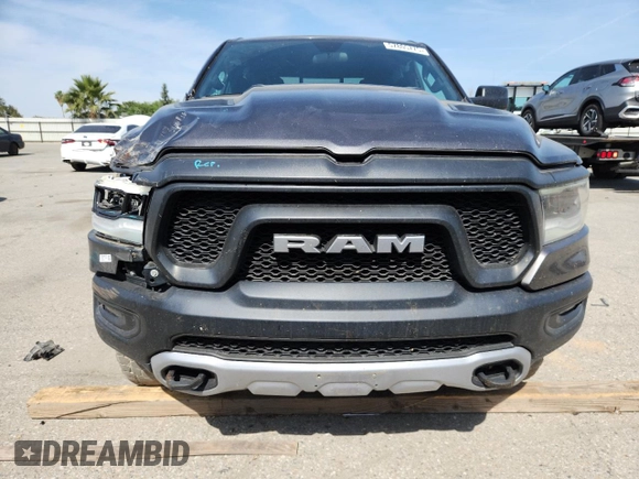 2019 Ram 1500 Rebel z VIN 1C6SRFET7KN875819, wystawiony jako Copart lot #57805775 z przebiegiem 80 521 mil mil oraz Szkoda całkowita • Salvage title. Historia ofert i sprzedaży dostępna na DreamBid. Obrazek 5.