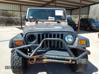 2005 Jeep Wrangler Sport with VIN 1J4FA49S45P345673, listed as a IAAI auction lot 41830128 with 139,432 mi miles. Bid and sale history available at carsss.com. Image 6.