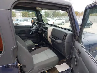 2006 Jeep Wrangler Sport with VIN 1J4FA49S16P737060, listed as a IAAI auction lot 41784197 with 42,030 mi miles. Bid and sale history available at carsss.com. Image 5.