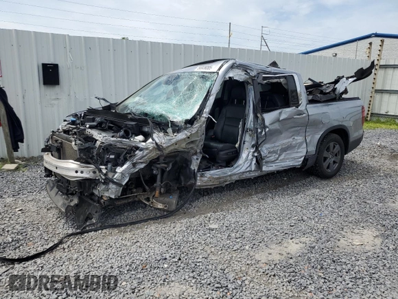 2020 Honda Ridgeline RTL-E с VIN 5FPYK3F70LB003853, выставлен на аукционе Copart как лот 56938085 с пробегом Не указан миль и Списание • Salvage title. История ставок и продаж доступна на DreamBid. Изображение 1.