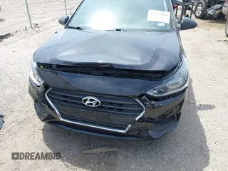 2018 Hyundai Accent SE z VIN 3KPC24A31JE010519, wystawiony jako IAAI lot #42241964 z przebiegiem 18 394 mil mil oraz . Historia ofert i sprzedaży dostępna na DreamBid. Obrazek 17.
