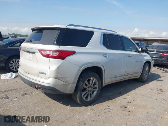 2020 Chevrolet Traverse High Country with VIN 1GNEVNKWXLJ135322, listed as a IAAI auction lot 42042466 with 105,748 mi miles and . Bid and sale history available at DreamBid. Image 4.