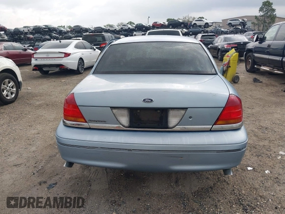 1999 Ford Crown Victoria z VIN 2FAFP73WXXX221069, wystawiony jako IAAI lot #41750127 z przebiegiem 177 142 mil mil oraz . Historia ofert i sprzedaży dostępna na DreamBid. Obrazek 16.