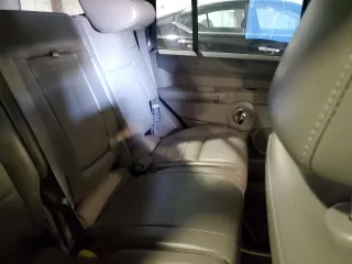2010 Jeep Commander Sport with VIN 1J4RG4GT7AC113206, listed as a Copart auction lot 56103825 with 174,306 mi miles and Salvage title. Bid and sale history available at DreamBid. Image 11.