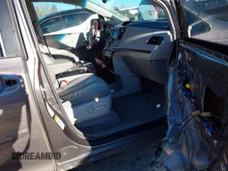 2011 Toyota Sienna XLE with VIN 5TDDK3DC8BS009739, listed as a IAAI auction lot 41638710 with 235,396 mi miles. Bid and sale history available at carsss.com. Image 5.
