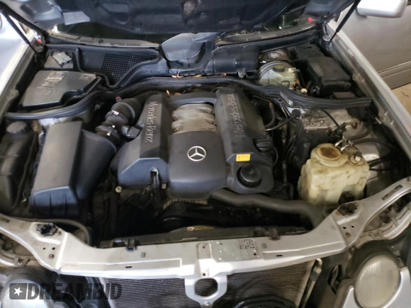 1999 Mercedes-Benz E-Class with VIN WDBJF82H4XX021888, listed as a Copart auction lot 83069274 with 173,198 mi miles and Salvage Title. Bid and sale history available at carsss.com. Image 11.