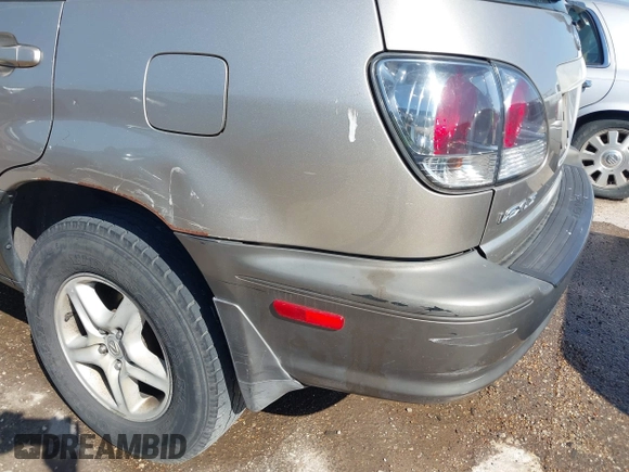 2001 Lexus RX 300 with VIN JTJGF10U410088393, listed as a IAAI auction lot 41864872 with 212,728 mi miles and . Bid and sale history available at DreamBid. Image 12.