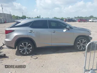 2019 Lexus RX 350 z VIN 2T2ZZMCA3KC123630, wystawiony jako IAAI lot #42436711 z przebiegiem 63 989 mil mil oraz . Historia ofert i sprzedaży dostępna na DreamBid. Obrazek 14.
