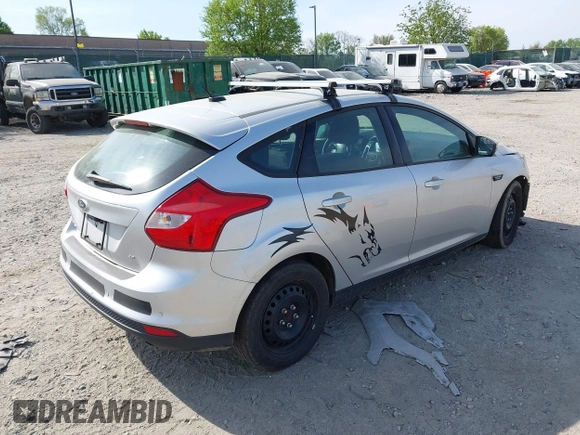 2012 Ford Focus SE with VIN 1FAHP3K20CL223856, listed as a IAAI auction lot 42096207 with 126,838 mi miles and . Bid and sale history available at carsss.com. Image 4.