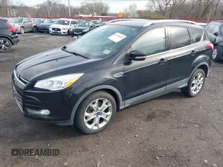 2014 Ford Escape Titanium with VIN 1FMCU9J98EUD73818, listed as a IAAI auction lot 42036442 with 129,794 mi miles. Bid and sale history available at carsss.com. Image 17.