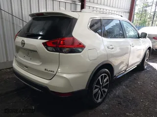 2018 Nissan Rogue S with VIN JN8AT2MV3JW311177, listed as a IAAI auction lot 41984736 with 57,241 mi miles. Bid and sale history available at carsss.com. Image 4.