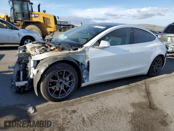 2020 Tesla Model 3 Standard Range Plus with VIN 5YJ3E1EA0LF808571, listed as a Copart auction lot 47827615 with 125,444 mi miles and Salvage Title. Bid and sale history available at DreamBid. Image 1.