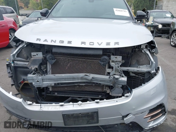 2020 Land Rover Range Rover Velar R-Dynamic S with VIN SALYK2EX7LA242015, listed as a IAAI auction lot 42066743 with 69,632 mi miles and . Bid and sale history available at DreamBid. Image 6.