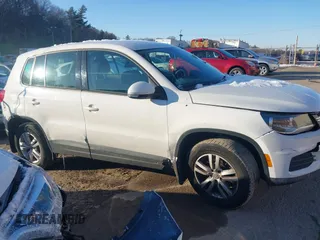 2013 Volkswagen Tiguan SE z VIN WVGBV3AX3DW608410, wystawiony jako IAAI lot #41397876 z przebiegiem 119 867 mil mil oraz . Historia ofert i sprzedaży dostępna na DreamBid. Obrazek 13.