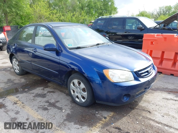2006 Kia Spectra EX with VIN KNAFE122965293874, listed as a IAAI auction lot 42111219 with 241,644 mi miles. Bid and sale history available at carsss.com. Image 1.