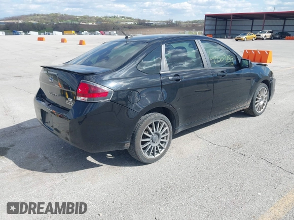 2010 Ford Focus SES with VIN 1FAHP3GN7AW291389, listed as a IAAI auction lot 42003153 with 151,987 mi miles. Bid and sale history available at carsss.com. Image 4.
