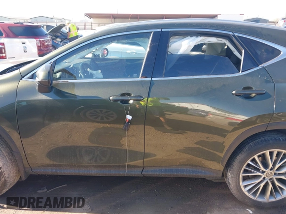 2022 Lexus NX with VIN JTJGGCEZ0N2001029, listed as a IAAI auction lot 41205502 with 26,124 mi miles. Bid and sale history available at carsss.com. Image 14.